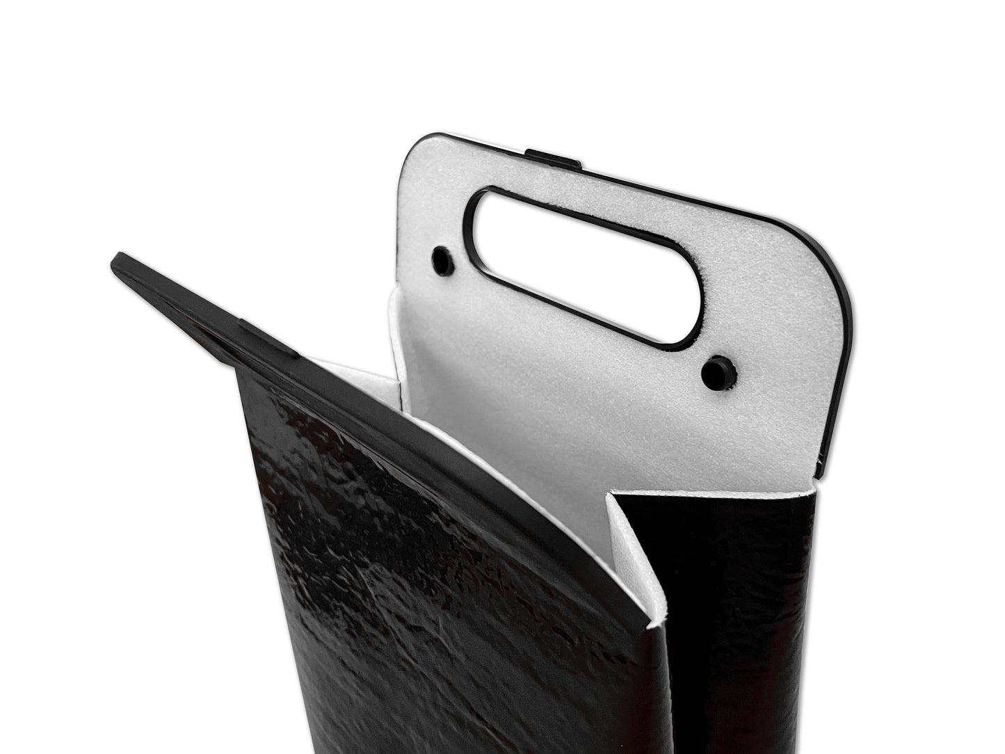 Snap top insulated beverage carrier in all black, interior of handle showing snaps