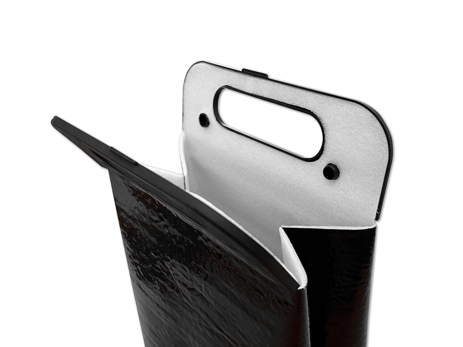 Snap top insulated beverage carrier in all black, interior of handle showing snaps